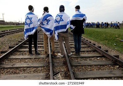 OSWIECIM, POLAND - APRIL 16, 2015: Holocaust Remembrance Day Next Generation Of People From The All The World Meets On The March Of The Living In German Death Camp In Auschwitz Birkenau, In  Poland