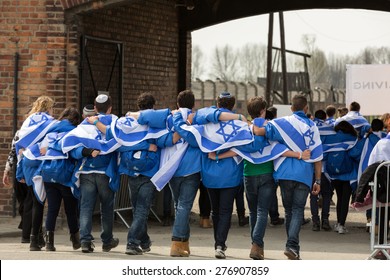 OSWIECIM, POLAND - APRIL 16, 2015: International Holocaust Remembrance Day . Annually People From The All The World Meets On The March Of The Living In German Concentration Camp In Auschwitz Birkenau.