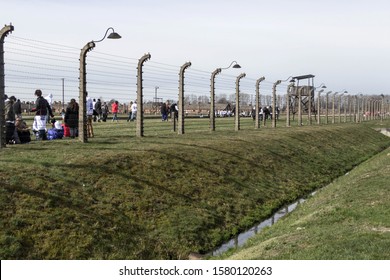 Oswiecim, Poland - March 30, 2016: The Auschwitz Camp, Which Was Once Full Of Prisoners, Is Now Full Of High School Students Studying The Holocaust