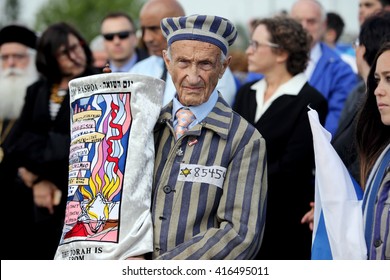 OSWIECIM, POLAND - MAY 5, 2016: International Holocaust Remembrance Day. People from the all the world meets on the March of the Living in german Concentration Camp in Auschwitz Birkenau.Poland 