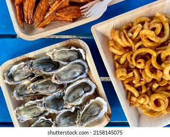 Osyters, Curly Fries And Sweet Potato Wedges