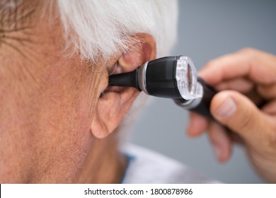 Otolaryngology Check. Doctor Checking Ear Using Otoscope