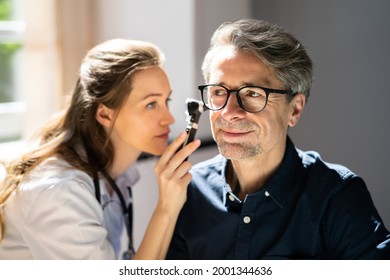 Otolaryngology Ear Check Using Otoscope. Doctor Examining Patient