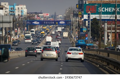 Otopeni, Romania - February 24, 2021: Smog Over Cars In Traffic At Rush Hour On A National Road In Otopeni, 15 Km North Of Bucharest, Romania.