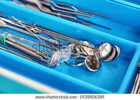 Otorhinolaryngology or ENT surgery instruments in a blue medical box
