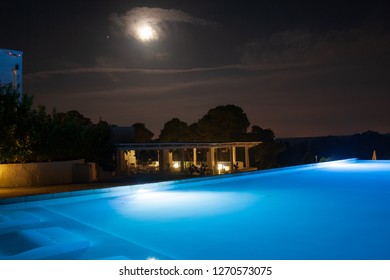 Otranto, Puglia / Italy - September 19 2018: Swimming Pool In Beautiful Luxury Resort Into The Nature With No People And Moon, Near Laghi Alimini, Lecce, Salento, Puglia, South Italy