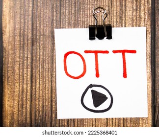 OTT. Over The Top - The Concept Of Providing Video Services Over The Internet. Text On Piece Of Paper On The Table.