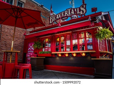 Ottawa, ON—Sept 20, 2019; Red Wooden Kiosk Shop With Sign Displaying Words “beaver Tails” Announcing They Sell A Doughnut Like Canadian Pastry Covered Covered In Maple Sugar Icing.