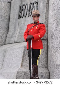 OTTAWA, CANADA - April 9, 2010, A Member Of The Royal Canadian Mounted Police Stands Guard At The National War Memorial.
 