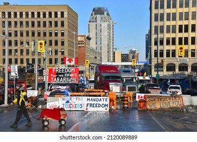 Ottawa, Canada Feb 7, 2022: Convoy Trucks Provide Blockage Between Wellington And Rideau Streets, A Main Transit Thoroughfare, As Part Of The Trucker Convoy Protest Which Has Shutdown Much Of Downtown