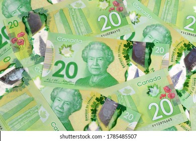 Ottawa, Canada - Jul 28, 2020: A Scramble Of $20 Canadian Dollar Banknotes Illustrative Image Concept For Canadian Economic Business Development. These Frontier Series Was First Circulated In 2011.