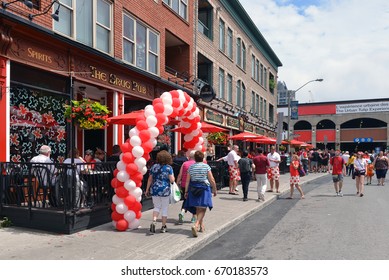 OTTAWA, CANADA - JULY 1, 2017: People Lineup To Get In The Heart And Crown Pub That Has Been Decorated For The 150th Anniversary Canada Day Celebrations In The Byward Market.