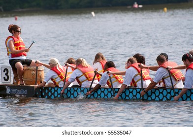 OTTAWA, CANADA - JUNE 19: Dragon Boat Team In Action At The Dragon Boat Race Festival June 19, 2010 In Ottawa, Ontario.