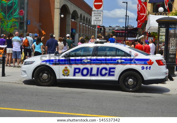 OTTAWA, CANADA,\
JUNE 30:Car of the Ottawa Police Service (OPS) (Service de police\
d\'Ottawa in French) serves the City of Ottawa, Ontario, Canada. on\
june 30 2013 in Ottawa\
Canada.