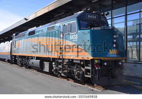 OTTAWA, CANADA - MAR. 10, 2012: VIA\
Diesel-Electric Locomotive in Ottawa railway station, Ottawa,\
Canada. VIA 6433 is a EMD F40PH-2\
locomotive.
