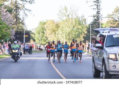 OTTAWA, CANADA  MAY 24, 2014: The Winner, Wilson Kiprop, And Other Unidentified Elite Athletes Running In The 10K Race In The Tamarack Ottawa Race Weekend. Kenyans Won The Top Five Places.