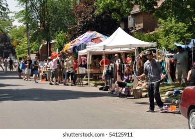 OTTAWA, CANADA -MAY 29:   Thousands Of People Gather At The Annual Glebe Neighborhood Garage Sale Which Takes Place For Several Blocks In The Glebe Area Of Ottawa, Ontario May 29, 2010.