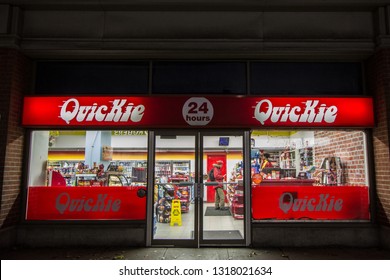 OTTAWA, CANADA - NOVEMBER 11, 2018: Quickie Logo In Front Of Their Store In Downtown Ottawa, Ontario At Night. Quickie Is A Chain Of Convenience Stores Spread All Accross Ontario

