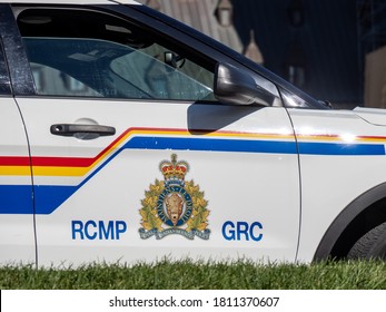 Ottawa, Canada, September 6, 2020; The Door Logo Crest Of A  White Royal Canadian Mounted Police RCMP Cruiser Near Parliament Hill In Ottawa