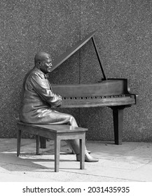 OTTAWA ONTARIO CANADA 08 22 2021: A bronze statue of the Canadian jazz pianist Oscar Peterson, outside Canada's National Arts Centre.