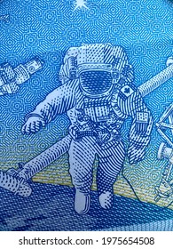 Ottawa, Ontario, Canada - 2021: The Reverse Of The Blue $5 (five Dollar) Bill From The Frontier Series Of Canadian Currency. Canadarm2 And Canadian Astronaut On A Space Walk. Polymer Bankote. 