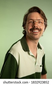 Ottawa, Ontario / Canada - April 12, 2020: 1980s Inspired Portrait Of A Man Wearing A Green Shirt