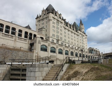 Ottawa, Ontario, Canada - April 2017: External view of the Hotel Fairmont Chateau Laurier and Rideau Canal locks