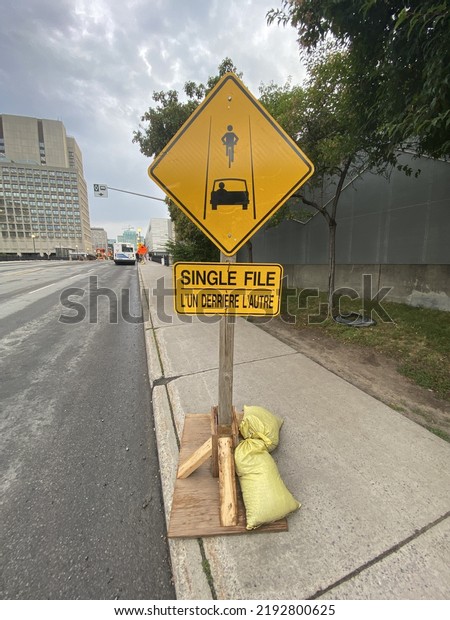 Ottawa Ontario Canada\
August 18 2022. Single file directional signage near the Rideau\
Centre shopping mall.