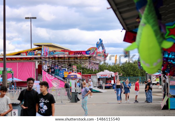 ottawa ontario canada august 23/2019 Capital\
fair exhibition rides, games, prizes. food, fun, bumper cars,\
roller coaster, ferris wheel, pirate\
ship.
