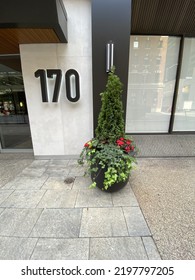 Ottawa Ontario Canada August 26 2022. Decorative Plant Box At A Condo Building Entrance Way With Address 170 Queen Street. 