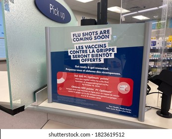 Ottawa Ontario Canada August 30 2020. Covid-19 Shoppers Drug Mart Get Your Flu Shots Here Cashier Station Signage.