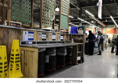 Ottawa, Ontario, Canada - December 07, 2019: Recycling Station And Waste Bins And Checkout Counters At The Food Court In Whole Foods Market, Lansdowne Park.