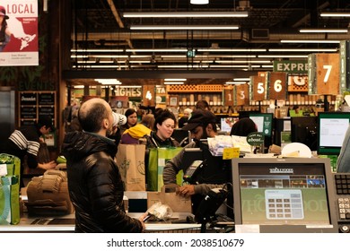 Ottawa, Ontario, Canada - December 31, 2019: Looking Down The Checkout Line At The Whole Foods Market, Lansdowne.