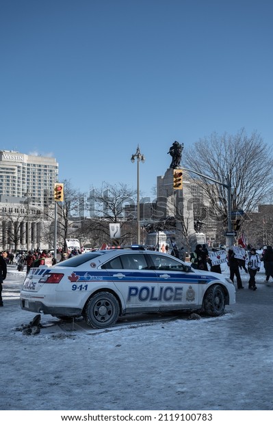 Ottawa, Ontario Canada - Feb 05,
2022: Trucker Freedom Convoy - police presence and barricades
