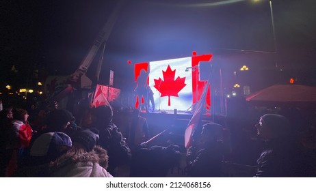 Ottawa Ontario Canada February 12 2022. Freedom Convoy 2022 Main Stage Crowd Protesting Against Government's COVID-19 Vaccine Mandate And Other Restrictions.