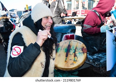 Ottawa, Ontario, Canada - February 5, 2022: Happy Woman With Traditional Indigenous Drum With Autographs