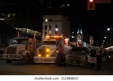 Ottawa, Ontario Canada - Jan 29 2022: Trucker Freedom Convoy - Trucks At Night