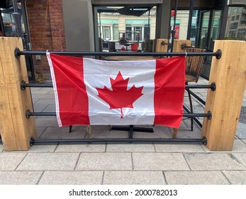 Ottawa Ontario Canada July 1 2021. Canada Day Rideau street Canada flag at Mavericks bar and music hall outdoor patio.