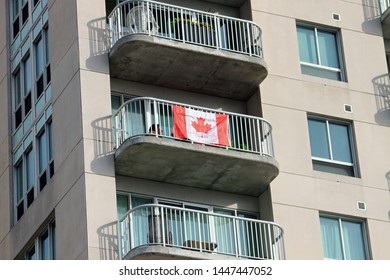 Ottawa Ontario Canada July 2 2019. Canada Day Flag On A Building Balcony In Downtown, Ottawa Ontario Canada.