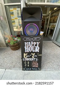 Ottawa Ontario Canada July 22 2022. Ottawa Bike Cafe Front Entrance Happy Hour Street Signage On Sparks Street.