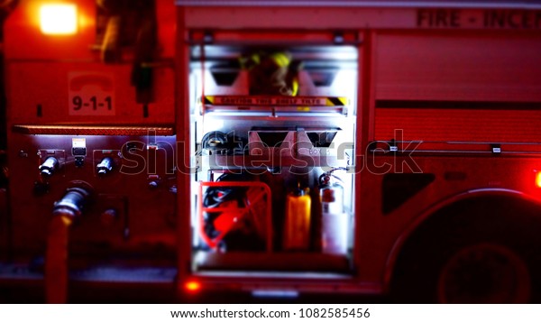 Ottawa, Ontario, Canada July 5,\
2013 Compartment with tools and attachments in a fire truck in\
Canada
