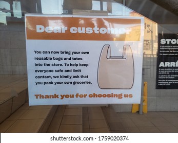 Ottawa Ontario Canada / June 14 2020: A Covid-19 Dear Customer Social Distancing Sign I Saw At A Local Loblaws Store. The Signs States That Customers Bring Their Own Bags And Pack Own Groceries.