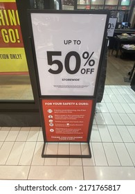Ottawa Ontario Canada June 23 2022 50 percent off  storefront signage in the Rideau centre.