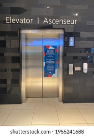 Ottawa Ontario Canada March 27 2021. Rideau Centre Mall Elevator Physical Distancing Signage.