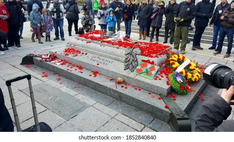 Ottawa Ontario Canada / November 11 2018. Remembrance Day Photo Of The Tomb Of The Unknown Soldier And Crowd.