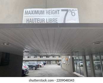 Ottawa Ontario Canada September 22 2022. Econo Lodge Hotel Maximum Height Sign Seven Feet Six Inches Overtop Of A Car Park Entrance Way.