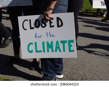 Ottawa, Ontario, Canada - September 27, 2019: "Closed for the climate" sign at the climate strike.