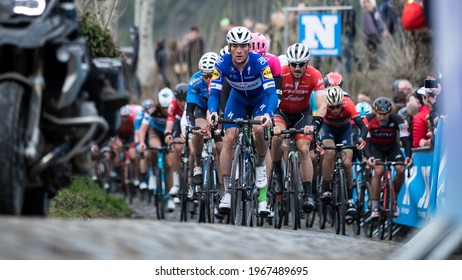 Oude Kwaremont, Belgium - April 1, 2018: Team Quickstep Rider Yves Lampaert Leading The Peloton At The Ronde Van Vlaanderen UCI Men Elite Road Racing Event