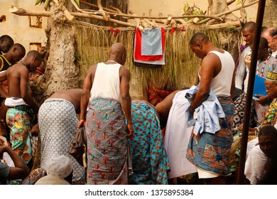 Ouidah, Benin January 10 2015 Voodoo Festival, Men Are Busy With A Ritual