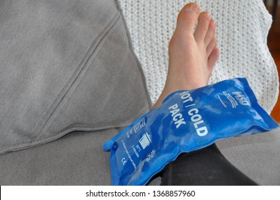 Oulu, Finland 4.142019. Athlete Applying Ice To Injured Ankle. Hot And Cold Pack In Every Day Use. 